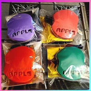 4 plastic apple car air fresheners. 4 colors.